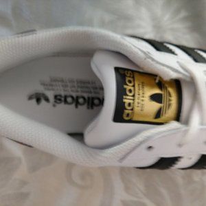 Women's Adidas Sneakers size 7 1/2 NEW Never worn